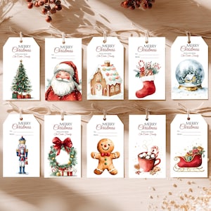 May include: A set of white Christmas gift tags featuring watercolour illustrations. Designs include a Christmas tree, Santa Claus, a gingerbread house, a stocking, a snow globe, a nutcracker, a wreath, a gingerbread man, hot cocoa, and a sleigh.