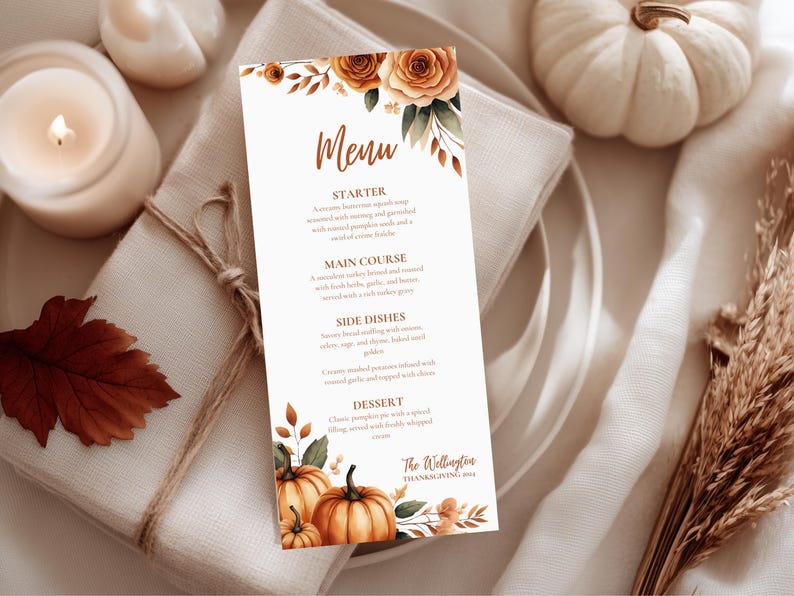 K&ouml;nnte beinhalten: Eine Thanksgiving-Men&uuml;karte mit einem Aquarelldesign. Das Men&uuml; zeigt ein Blumenarrangement mit K&uuml;rbissen und Rosen. Das Men&uuml; enth&auml;lt den Text "Men&uuml;" und den Namen "The Wellington Thanksgiving 2024".