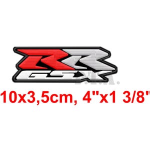 Op de afbeelding: Geborduurde patch met de letters "GSR" in rood en wit, met een zwarte rand. De patch is 10 cm x 3,5 cm (ongeveer 4" x 1 3/8") en is bedoeld voor toepassing op kleding of accessoires.