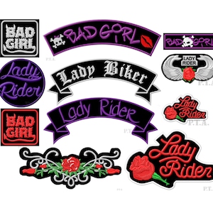 May include: A selection of embroidered biker patches. The patches display phrases such as "Bad Girl" and "Lady Rider" in diverse fonts and colours, including red, purple, and white. Some patches incorporate roses and wings.