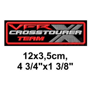 May include: Embroidered patch with the text "VFR CROSSTOURER TEAM" in red and white on a black background. The patch is rectangular, with dimensions of 4 3/4" x 1 3/8".