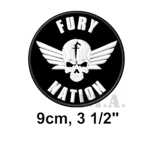 May include: Embroidered patch with a black background featuring a white skull with wings and the words "FURY NATION" in white. The patch is 3 1/2 inches in diameter.
