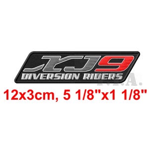 May include: Black embroidered patch with the text "KJ9 DIVERSION RIDERS". The patch is rectangular, with the text in white and red. The patch measures 5 1/8" x 1 1/8".