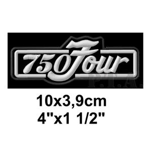 May include: Embroidered patch with the text "750 Four" in white, outlined in white, on a black background. The patch measures 4" x 1 1/2".