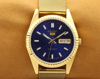 Vintage refurbished Seiko 5 golden blue dial men's working wrist watch 35mm..