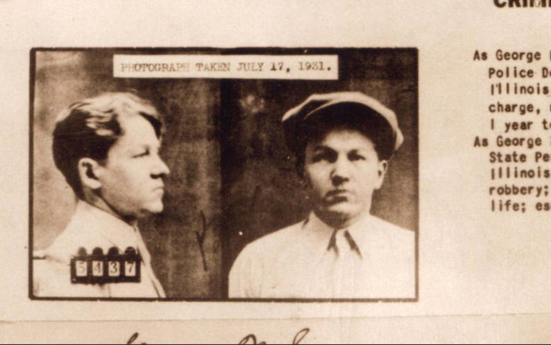 May include: Black and white mugshot of two men taken on July 17, 1981. Both men are looking at the camera. The man on the left has short dark hair and is wearing a white shirt. The man on the right has short dark hair and is wearing a white shirt and a dark cap.