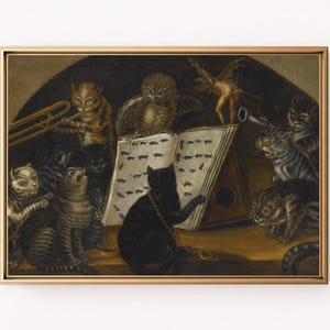 May include: A framed painting depicts a whimsical scene of cats playing musical instruments. A black cat conducts while others play a trombone, trumpet, and other instruments. An owl and a cherub are also present.