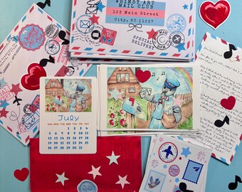 May include: A stationery set featuring envelopes with red and blue striped borders, a July calendar card, a letter, and sticker sheets. The items are decorated with musical notes, red hearts, stars, and postal stamps labeled Whimsy Art Mail Club.