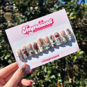 Unghie a forma di papera Ed Hardy XL I CHARMS POSSONO VARIARE