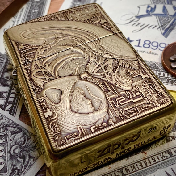 Zippo “alien” (1979) Themed Engraved Brass Armor Lighter H.R. Giger  Inspired Artwork