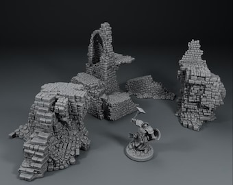 Op de afbeelding: Een grijze miniatuur fantasy terreinset met stenen ruïnes en een klein beeldje. De set bevat meerdere gebroken muren, bogen en trappen, allemaal gemaakt van getextureerde steen. Het beeldje houdt een wapen vast.