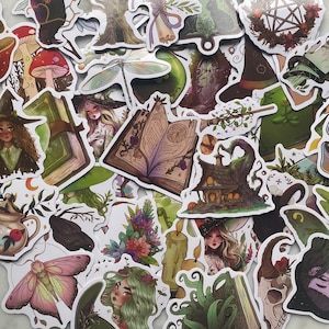May include: A collection of whimsical stickers featuring illustrations of witches, mushrooms, books, and other mystical elements. The stickers are in various shapes and sizes, with a color palette of greens, browns, and pinks. Perfect for decorating journals, laptops, or other items.