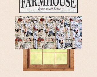 May include: A rectangular sign with the text FARMHOUSE home sweet home in black lettering, positioned above a gathered window valance featuring a repeating print of roosters, pigs, cows, red barns, and farm-themed text on a light background.