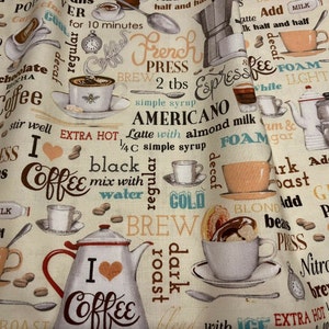 May include: A cream-colored fabric featuring a repeating pattern of coffee-themed illustrations including various mugs, teapots, coffee beans, and spoons, interspersed with text such as "I love coffee," "Americano," "French press," "Latte," and "Nitro brew."