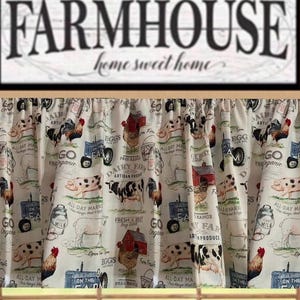 May include: Farmhouse-themed kitchen curtains with a repeating pattern of farm animals, tractors, and text. The curtains are cream-colored and feature illustrations of cows, pigs, chickens, and farm buildings. The top of the image shows a sign that reads "FARMHOUSE home sweet home."