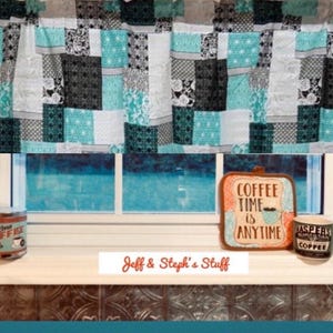 May include: A patchwork valance in shades of teal, gray, and white hangs above a window. Below, a windowsill displays a coffee tin, a decorative sign that reads "Coffee Time is Anytime", and a coffee mug. The text "Jeff & Steph's Stuff" is also visible.