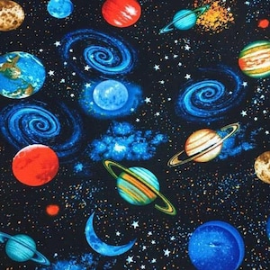 May include: A fabric pattern featuring a vibrant space theme. The design includes planets with rings, swirling galaxies, stars, and a crescent moon, all set against a dark blue background. The planets are in shades of red, blue, green, and brown.