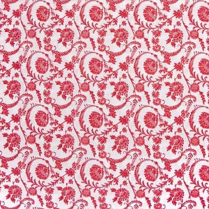 May include: A white fabric featuring a repeating pattern of vibrant red floral motifs. The design consists of stylized flowers and swirling vine-like stems that create a continuous, interconnected botanical print across the entire surface.