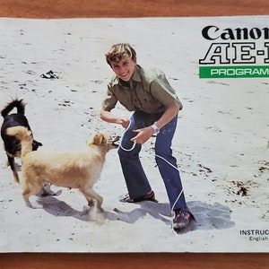 Canon AE-1 Program Users Manual Original 1981 Print copy. Boy /w dogs cover