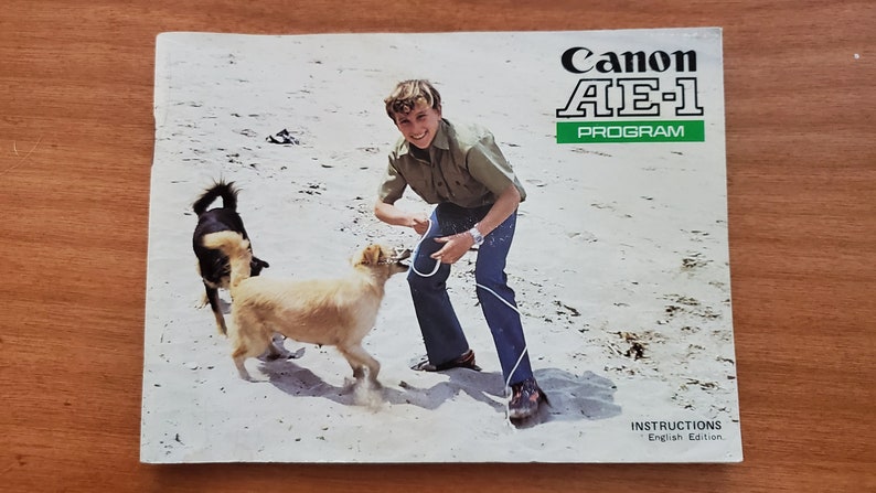 Canon AE-1 Program Users Manual Original 1981 Print copy. Boy /w dogs cover