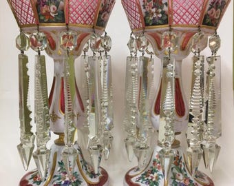 A beautiful pair of large antique Bohemian overlay glass lusters in good condition.”