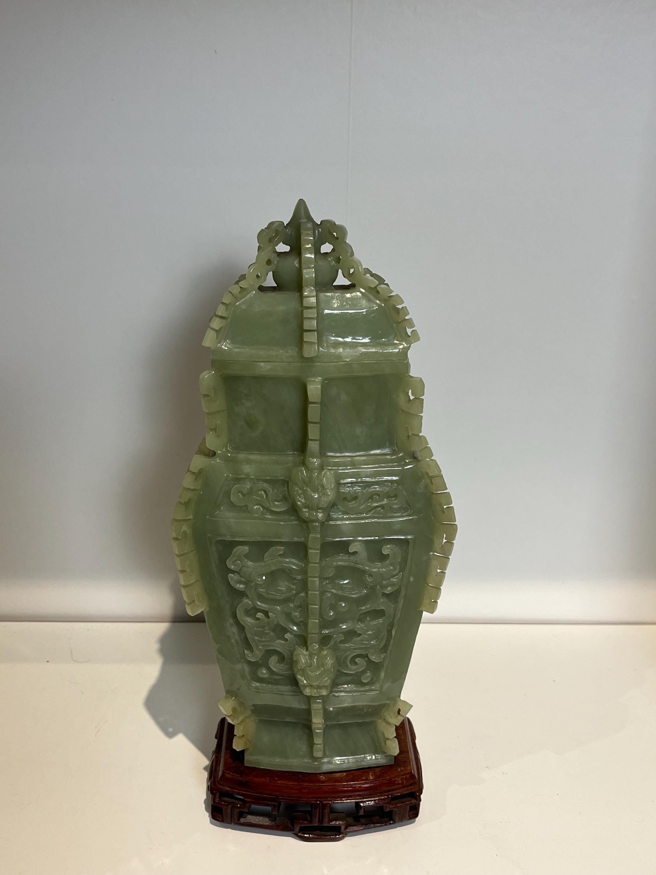 old Chinese jar jade in good condition with wood base