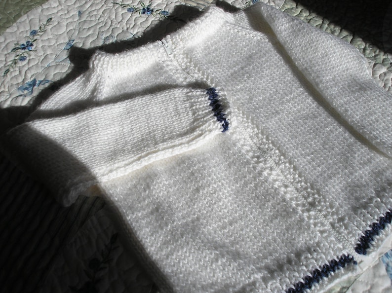 White with Navy Trim Knitted Zippered Childs Sweater
