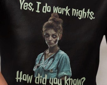 May include: Black long-sleeved shirt with a graphic of a zombie nurse and the text "Yes, I do work nights. How did you know?"