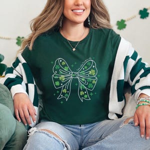 Coquette St. Patrick&#39;s Day Shirt, Shamrock Bow Tee, Lucky Irish Trendy Shirt, Aesthetic Clover Outfit, Festive Patrick’s Day Tee, T199