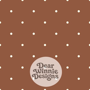 May include: A brown background featuring a repeating pattern of small, evenly spaced white polka dots. A circular light beige logo is centered at the bottom, displaying the dark brown text Dear Winnie Designs in a stylized, rounded font.