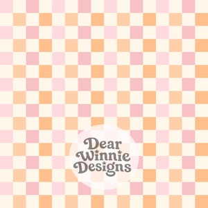 May include: A repeating chequered pattern featuring alternating squares of light pink, soft orange, and cream. A circular white overlay in the lower centre displays the dark grey text Dear Winnie Designs in a stylised, rounded font.