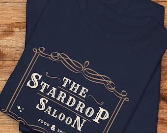 Camiseta de Stardew Valley, Pelican Town, Stardrop Saloon, regalo acogedor para gamers
