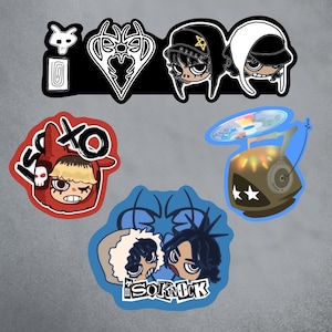 May include: A collection of colorful stickers featuring cartoon illustrations. Designs include stylized faces, a robot with a CD, and text that reads "XOXO" and "SOKNICK". The stickers have a variety of shapes and colors.