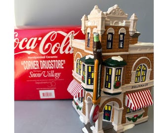 Department 56 Snow Village Coca Cola Corner Drugstore 5484-4 Box & Light