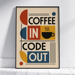 May include: A rectangular wall art print in a black frame featuring the text COFFEE IN CODE OUT. The design uses geometric shapes in red, blue, yellow, and black on a cream background, including a black coffee cup icon with steam lines.