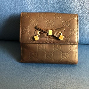 Cartera Gucci con monograma de cuero marrón oscuro