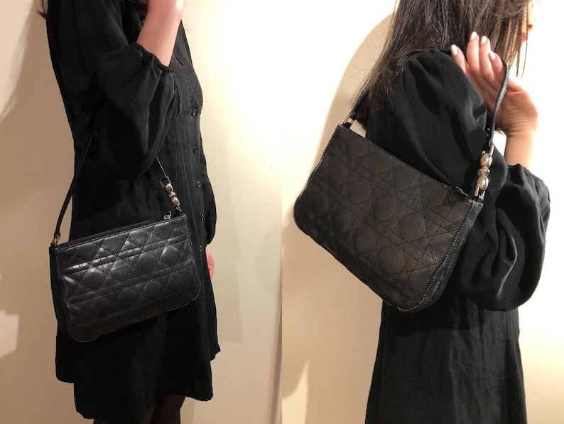 May include: Two black quilted shoulder bags with silver hardware. The bags have a flap closure and a chain strap.
