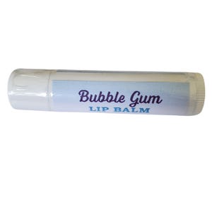 May include: A white tube of lip balm with a blue and white label that says "Bubble Gum Lip Balm" in purple lettering.