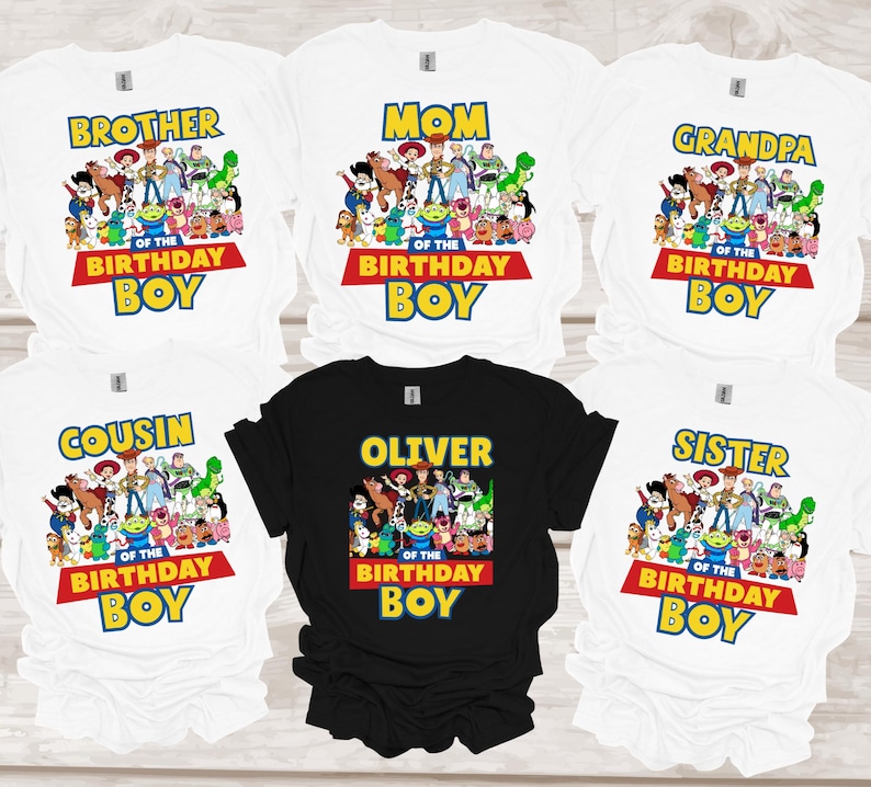 May include: White and black t-shirts with a Toy Story graphic. The white shirts have text that says "Brother", "Mom", "Grandpa", "Cousin", and "Sister" above "Of The Birthday Boy". The black shirt says "Oliver" above "Of The Birthday Boy".