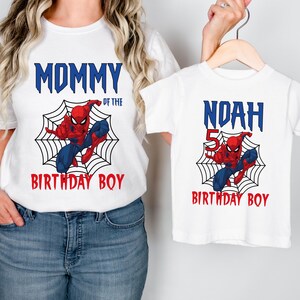 May include: White t-shirts with a Spiderman graphic and text that reads "Mommy of the Birthday Boy" and "Noah Birthday Boy".