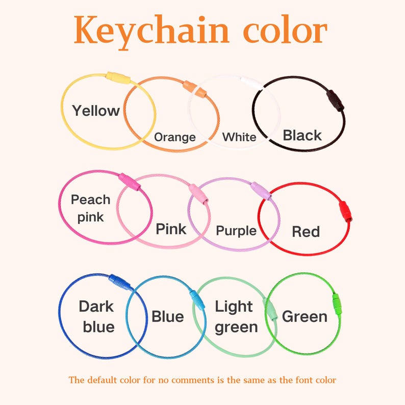 May include: A collection of twelve circular wire keychains in various colors, each featuring a screw-type barrel closure. The colors include yellow, orange, white, black, peach pink, pink, purple, red, dark blue, blue, light green, and green.