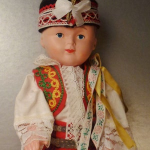 DOLL POLAND Papier Mache  Handcrafted beautiful Boy Folk embroidered costume app 12 x4 x3 inches mint condition 1940s
