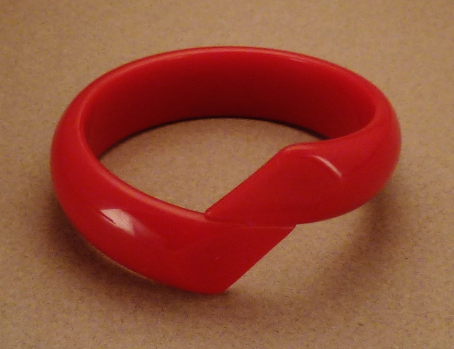 Moderne BAKELITE BRACELET CUFF  Round bright red red Cuff 3 in diam 1 1/2 in wide