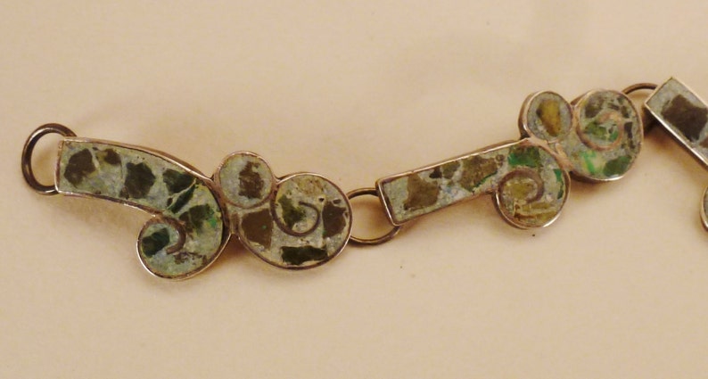MEXICAN STERLING BRACEET Taxco Signed 5 links Inlaid stones cutout floral design app 7 in long 58 in wide