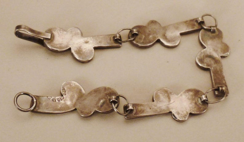 MEXICAN STERLING BRACEET Taxco Signed 5 links Inlaid stones cutout floral design app 7 in long 58 in wide