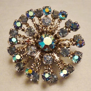 BRIDAL Stunning STARBURST  BROOCH Aurora Borealis  blue  rhinestones app 1 1/2 in diam