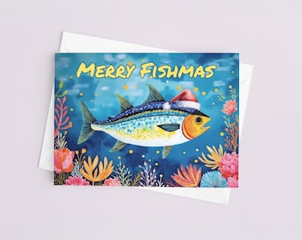 May include: A greeting card featuring a colorful fish wearing a Santa hat, with the words "MERRY FISHMAS" in yellow. The fish is surrounded by aquatic plants and set against a blue background. The card is inside a white envelope.