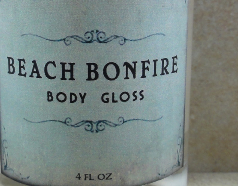 Beach Bonfire Body Gloss Smoky Woods, Ambre doré, Guimauve rôtie Collection Summer Lovin' image 1