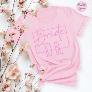 花嫁になるTシャツ | ブライダルシャワーギフト、独身パーティーTシャツ、婚約シャツ、婚約生活、結婚トップ、