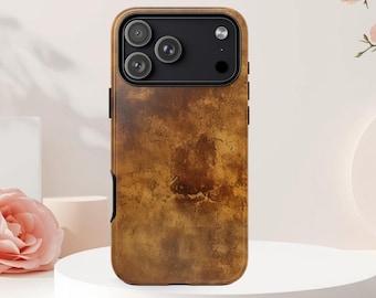 May include: A smartphone case featuring a textured, mottled brown and gold surface that resembles aged metal or stone. The case has a black rectangular camera module cutout at the top, housing three circular camera lenses and a flash.